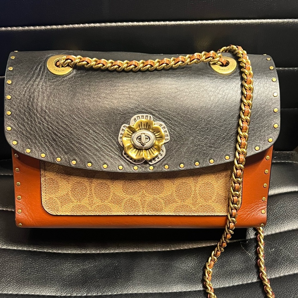 Coach Parker with Rivets and snakeskin detail